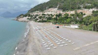Antalya Büyükşehir Belediyesi, Sarısu Kadınlar Plajı’nı yeni sezonda da binlerce