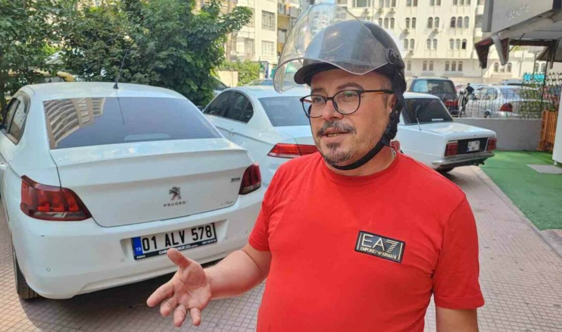 Adana’da bir kişiye otomobil kullandığı sırada kask takmadığı için 993